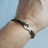 Figure 8 Descender and Functional Carabiner Bracelet - Handmade in sterling silver - Modeled on woman's wrist