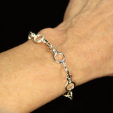 Figure 8 Descender Linked Bracelet - Handmade in sterling silver - Modeled on wrist