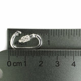 sterling silver miniature carabiner clasp shown next to ruler