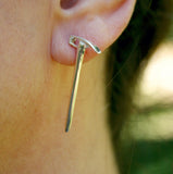 Ice axe post earrings in sterling silver, modeled