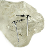 Ice axe post earrings in sterling silver, crystal background